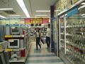 den_den_town-used_stuff_section_of_a_store.jpg